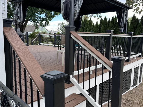 Composite deck with pergola